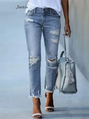 Distressed Stretch Denim Jeans